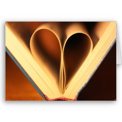 A book with folded pages shaped like a heart